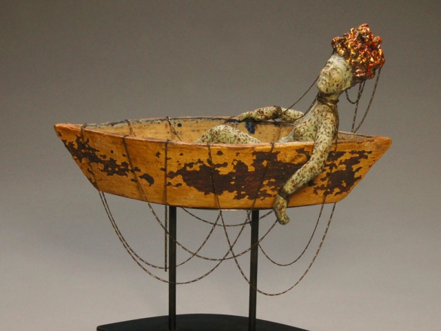 "Adrift" Ceramic, chain, gold leaf, iron base. 11 x 4.5 x 11.5 inches. ©Julia Mulligan