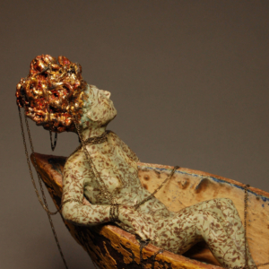 Detail, "Adrift". Ceramic, chain, gold leaf, iron base. Hand built. 11 x 4.5 x 11.5 inches.  &copy;Julia Mulligan