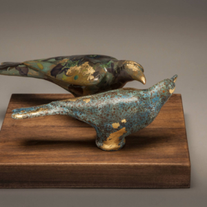 "The Lovers" Ceramic, ceramic decals, gold leaf. 11 x 8.5 x 5.5 inches. &copy;Julia Mulligan 2014. Hand Built. Sold, Coors Western Art Show and Sale.