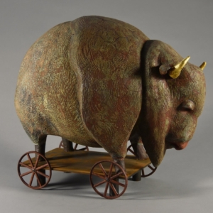 "Bison" Ceramic, gold leaf, iron base. 19 x 16 x 11 inches. &copy;Julia Mulligan
