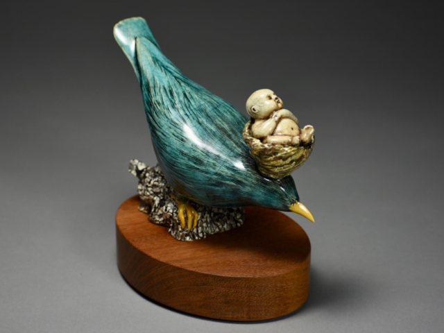 "The Things I Carry With Me". Porcelain, wood base. 7 x 3 x 6.5  inches. 2020 Governors Art Show (private collection)