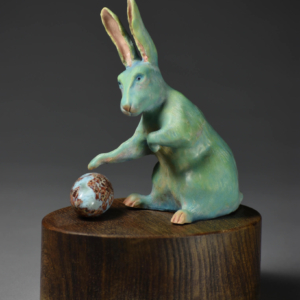 "Rabbit Rabbit". Porcelain, Wood, Larimar egg. 4 x 3 x 7 inches. Hand Built. &copy;Julia Mulligan