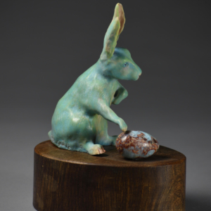 "Rabbit Rabbit". Porcelain, Wood, Larimar egg. 4 x 3 x 7 inches. &copy;Julia Mulligan