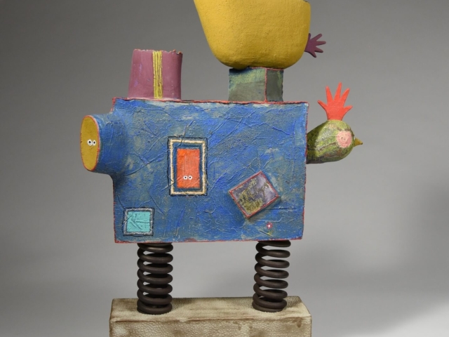 "My Bouncy House", rear view. Ceramic, steel, glaze, cold finish. 16.5" x 13" x 6"