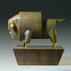 "Evolution: Bison" Ceramic, gold leaf, wood base. 12 x 8 x 13 inches. Hand built. 2020 Governors Art Show