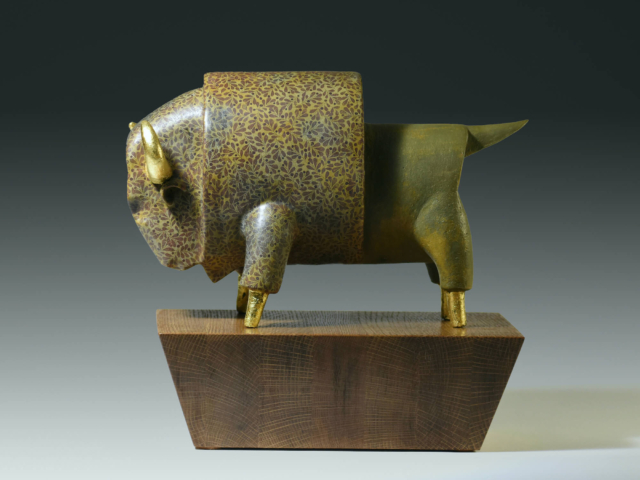 "Evolution: Bison" Ceramic, gold leaf, wood base. 12 x 8 x 13 inches. 2020 Governors Art Show
