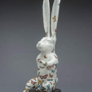 "White Rabbit Apocalypse". Ceramic, glaze, oil, wood base. 30.5 x 9 x 14 inches.