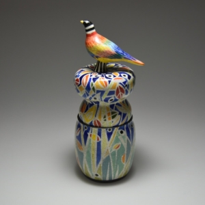 Bird in Hand Vessel. Porcelain, glaze. Thrown and hand built. 4.5 x 4.5 x 11.5 inches