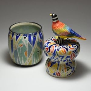 Bird in Hand Vessel. Porcelain, glaze. Thrown and hand built. 4.5 x 4.5 x 11.5 inches