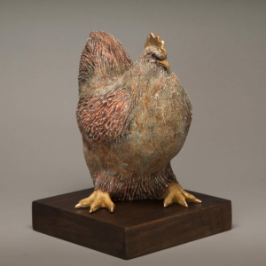 "La Gallina Gordita" Ceramic, Gold leaf, wood base. 11 x 7.5 x 9 inches. 2014