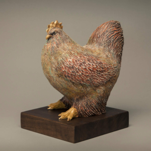 "La Gallina Gordita" Ceramic, Gold leaf, wood base. 11 x 7.5 x 9 inches.