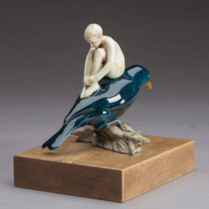 "I Wish I Had a Bird I Could Fly Away On" Porcelain. Hand built. 7 x 5.5 x 7.5 inches. &copy;Julia Mulligan. Private Collection.