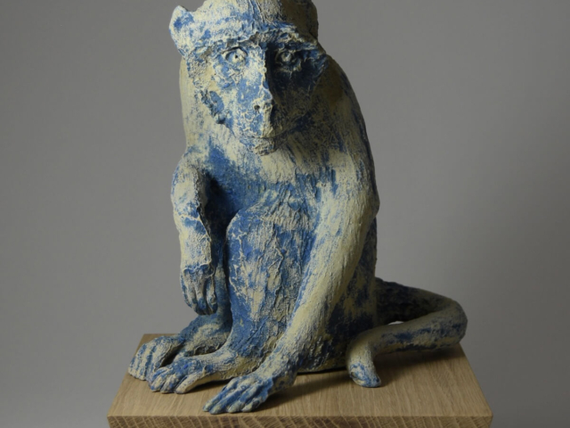 "Blue". Ceramic, glaze, wood base. 7.5 x 7.5 x 12 (including base)