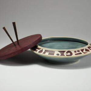 Chopstick Bowl. Porcelain, wood, iron. Wheel Thrown. 6.5 x 6.5 x 4.5 inches