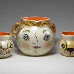 Pigtails and Pets (Vase and Cups).  Porcelain, Underglaze, Glaze.