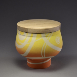 "Sunrise" Container with lid. Porcelain, Underglaze, Glaze, Hardwood Lid. 5.5 x 7.5 inches. &copy;Julia Mulligan