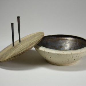 Tilt Bowl, lid off. Porcelain, wood, iron. Wheel Thrown. 5.5" x 5.5" x 4.5"