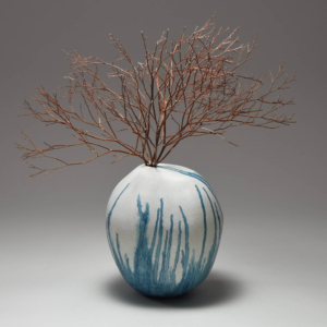 "Water Vase" Porcelain, glaze, oil. Wheel thrown and altered. 5.5 x 5.5 x 6 inches.
