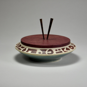 Chopstick Bowl. Porcelain, wood, iron. Wheel Thrown. 6.5 x 6.5 x 4.5 inches